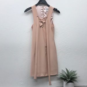 Sleeveless blush dress designed in Australia